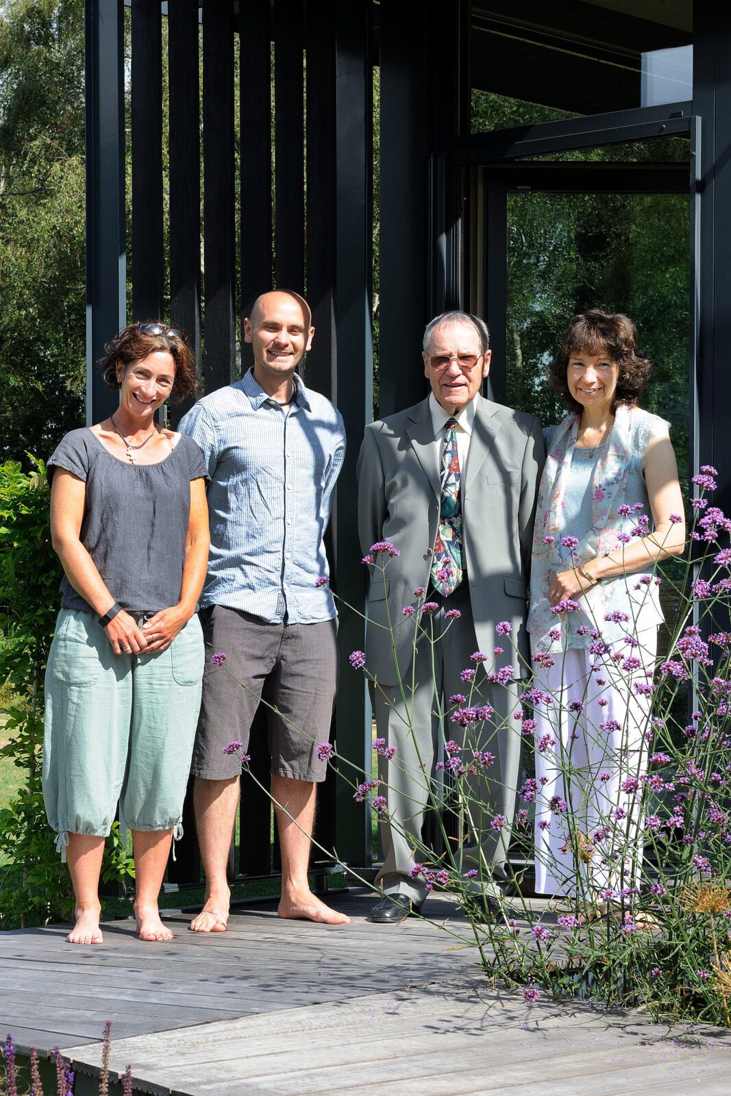 Clients and design team for Forest lodge at the entrance